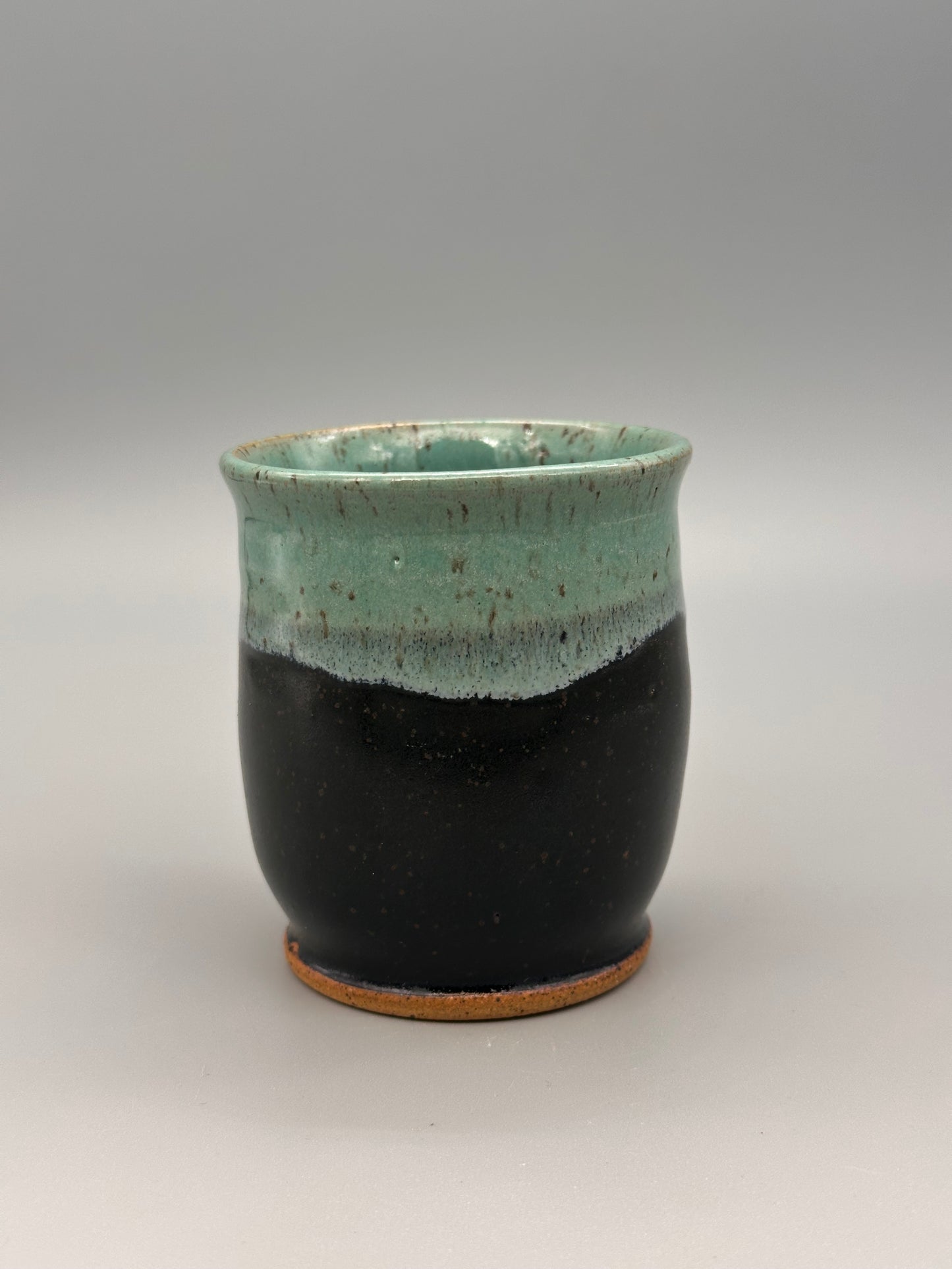 Black and teal esspresso/sipper cup