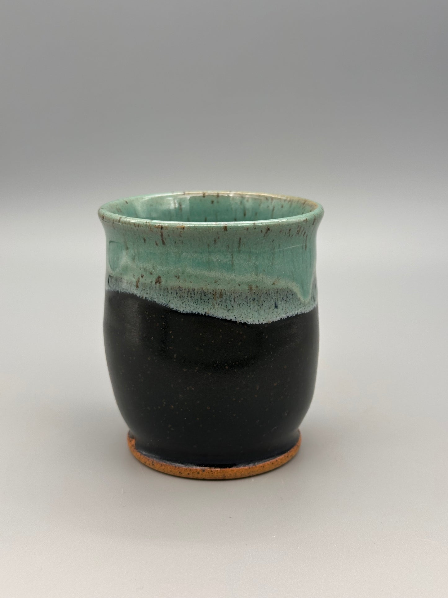 Black and teal esspresso/sipper cup